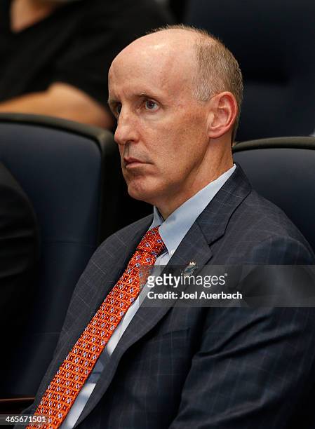 Head coach Joe Philbin of the Miami Dolphins looks on as new General Manager Dennis Hickey , answers questions from the media on January 28, 2014 at...
