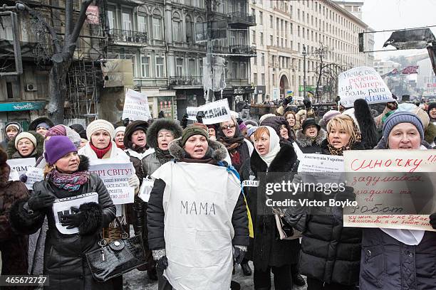 Women urge policemen not to use force against protesters on Grushevskogo Street on January 28, 2014 in Kiev, Ukraine. President Viktor Yanukovych has...