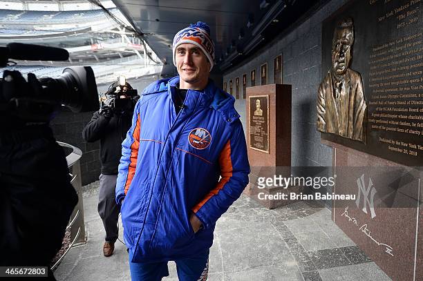Brock Nelson of the New York Islanders walks through Monument Park prior to the 2014 NHL Stadium Series practice session at Yankee Stadium on January...