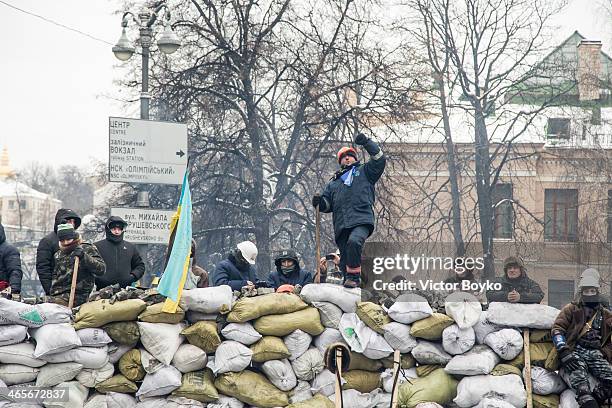 Protesters on top of the barricade on Grushevskogo Street on January 28, 2014 in Kiev, Ukraine. President Viktor Yanukovych has accepted the...