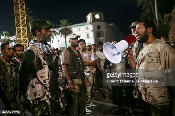 Rebels Military Commander Commander Abdelhakim Belhadj gives instructions to his troops for securing the Green Square in August 22, 2011 in...