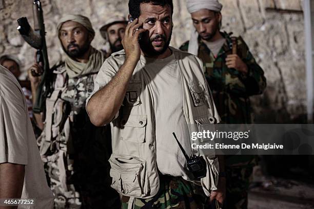 Rebels Military Commander Commander Abdelhakim Belhadj gives instructions to his troops for securing the Green Square in August 22, 2011 in...