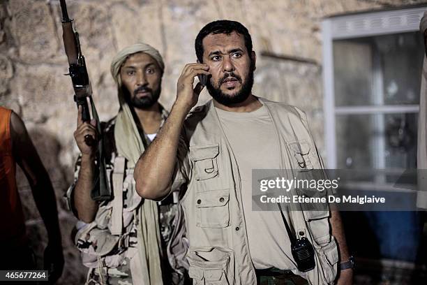 Rebels Military Commander Commander Abdelhakim Belhadj gives instructions to his troops for securing the Green Square in August 22, 2011 in...