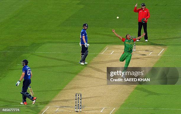 Bangladesh paceman Taskin Ahmed celebrates his wicket against England batsman Jos Buttler during their 2015 Cricket World Cup Pool A match at the...