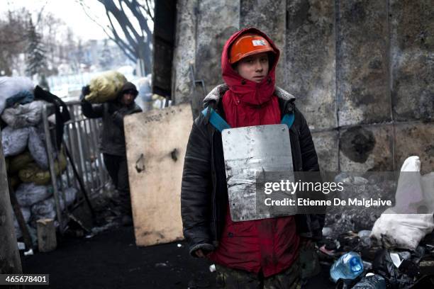 Protesters reinforce barricades around the Dynamo Stadium main gate on January 28, 2014 in Kiev, Ukraine. While Ukrainian parliament holds an...