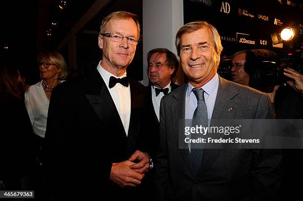 Ari Vatanen champion car driver and Vincent Bollore head of groupe Bollore during the 29th International Automobile Festival on January 28, 2014 in...