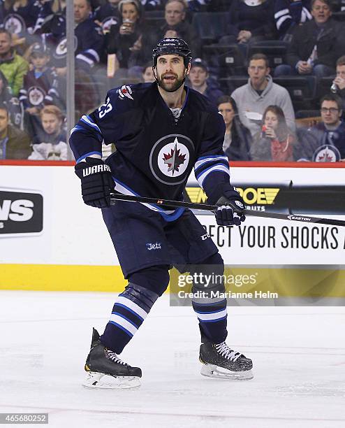 Jay Harrison of the Winnipeg Jets skates down the ice in second period action in an NHL game against the Ottawa Senators at the MTS Centre on March...