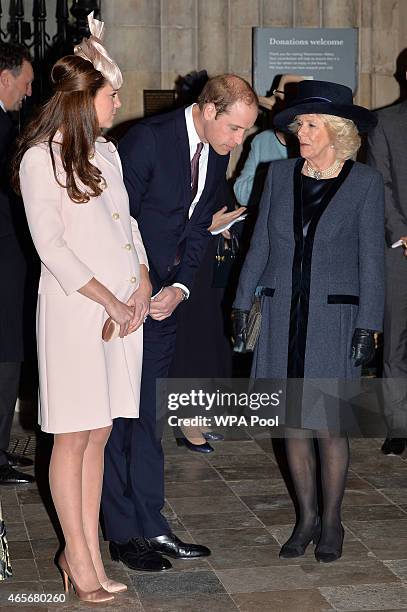 Catherine, Duchess of Cambridge and Prince William, Duke of Cambridge greet Camilla, Duchess of Cornwall as they attend the Observance for...