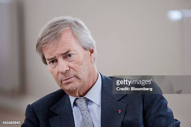 Vincent Bollore, billionaire and chairman of the Bollore Group, pauses during an interview at the Autolib' car-sharing headquarters in Vaucresson,...