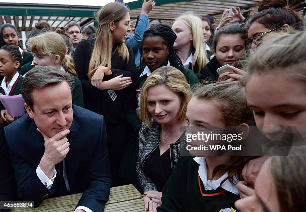 Prime Minister David Cameron meets pupils during a visit to the Green School For Girls with education secretary Nicky Morgan, on March 9, 2015 in...