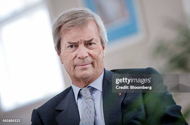 Vincent Bollore, billionaire and chairman of the Bollore Group, pauses during an interview at the Autolib' car-sharing headquarters in Vaucresson,...