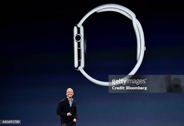 Tim Cook, chief executive officer of Apple Inc., smiles during the Apple Inc. Spring Forward event in San Francisco, California, U.S., on Monday,...