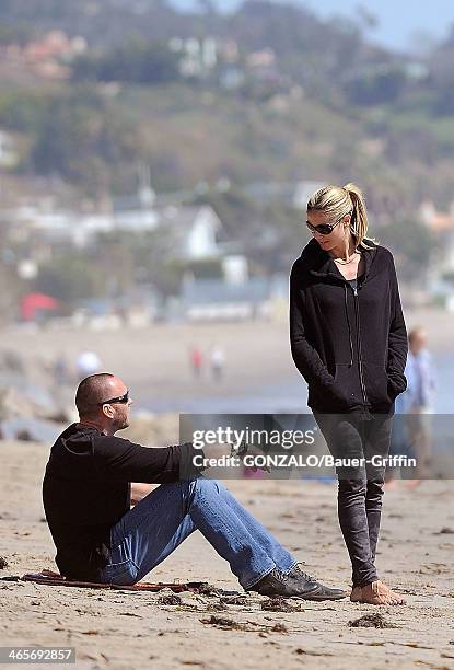 Heidi Klum is seen at the beach with Martin Kristen on March 10, 2013 in Los Angeles, California.