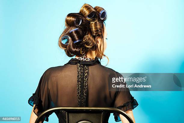 woman with big hair curlers - see through dress stockfoto's en -beelden