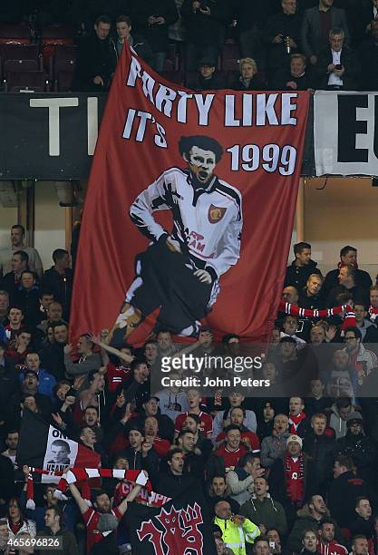 Manchester United fans display a banner celebrating Ryan Giggs' FA Cup semi-final goal of 1999 during the FA Cup Quarter Final match between...