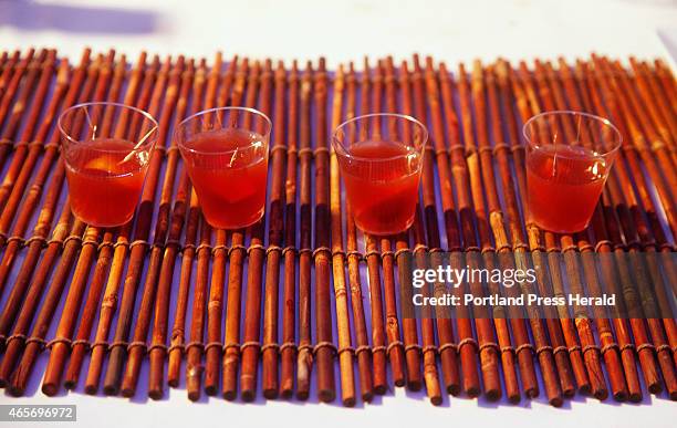 Samples of a Winter Madras, made with Double Cross vodka, Del Maguey Vida mezcal, orange juice, unsweetened cranberry juice and pomegranate molasses...