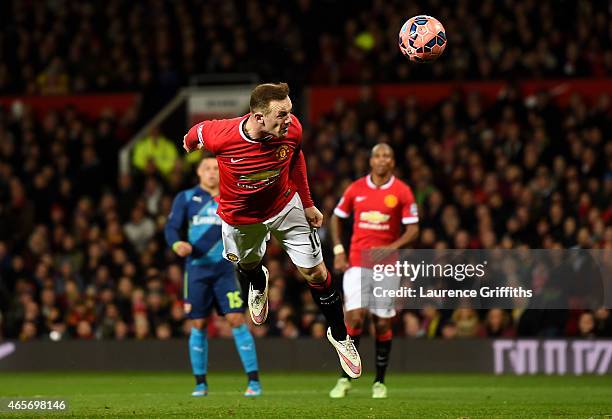 Wayne Rooney of Manchester United scores a goal to level the scores at 1-1 during the FA Cup Quarter Final match between Manchester United and...