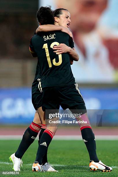 Celia Sasic and Fatmire Alushi of Germany celebrate the second goal during the Women's Algarve Cup match between Brazil and Germany on March 9, 2015...