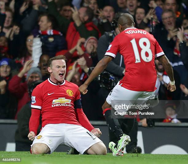 Wayne Rooney of Manchester United celebrates scoring their first goalduring the FA Cup Quarter Final match between Manchester United and Arsenal at...