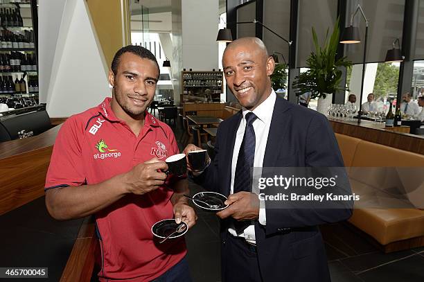 Reds player Will Genia poses with former Wallabies captain George Gregan at his cafe named GG Espresso on January 29, 2014 in Brisbane, Australia.