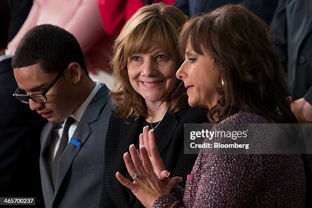 Mary Barra, chief executive officer of General Motors Co. , center, speaks to Andra Rush, president, founder and chief executive officer of Rush...