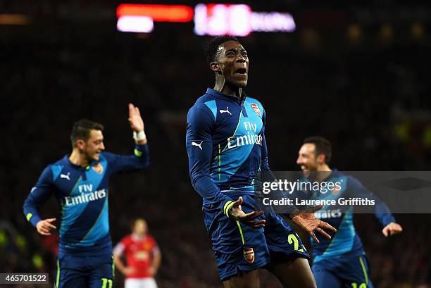 Danny Welbeck of Arsenal celebrates after scoring his team's second goal during the FA Cup Quarter Final match between Manchester United and Arsenal...