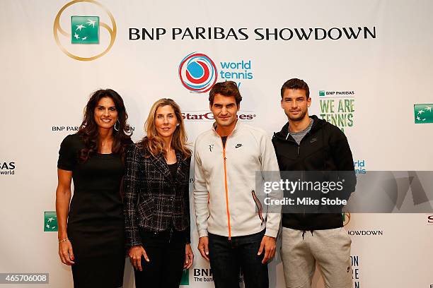 Paribas Showdown players Gabriela Sabatiniat, Monica Seles, Roger Federer and Grigor Dimitrov pose for a photo following a press conference at Essex...