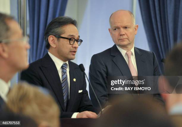 Indonesian Foreign Minister Marty Natalegawa and British Foreign Secretary William Hague brief journalists during a press conference after a meeting...