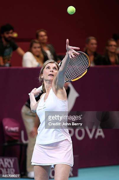 Michele Laroque in action during the Amelie Mauresmo Tennis Night to benefit the 'Institut Curie' to fight cancer during the 22nd Open GDF Suez held...