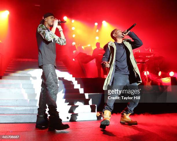 Rappers J. Cole and Kendrick Lamar perform at Madison Square Garden on January 28, 2014 in New York City.