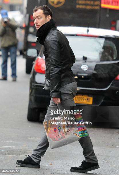 Jude Law shops in Soho on December 17, 2012 in New York City.