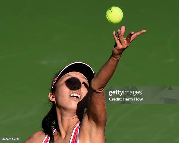 Mayo Hibi of Japan serves against Lesia Tsurenko of Ukraine during qualifying of the BNP Paribas Open tennis at the Indian Wells Tennis Garden on...