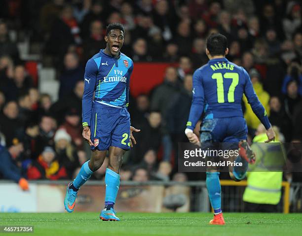 Danny Welbeck celebrates scoring Arsenal's 2nd goal with Alexis Sanchez during the match between Manchester United and Arsenal in the FA Cup 6th...