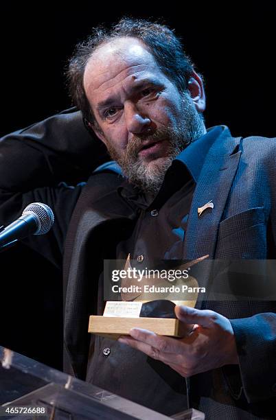 Actor Karra Elejalde holds the award for Best Supporting Actor Award in the film 'Ocho apellidos vascos' during the 24th Union de actores Awards...