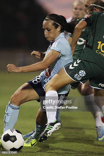 Emma Kete of Sydney FC attempts to get around Ashleigh Sykes of Canberra United during the round three W-League match between Canberra United and...