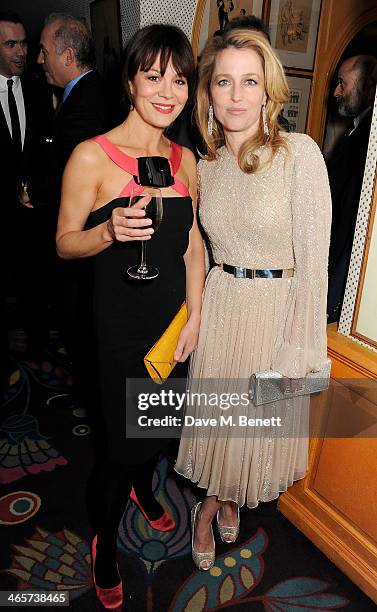 Helen McCrory and Gillian Anderson attend the Charles Finch and Chanel Pre-BAFTA cocktail party and dinner at Annabel's on February 8, 2013 in...