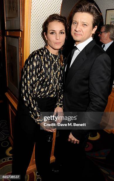 Noomi Rapace and Jeremy Renner attend the Charles Finch and Chanel Pre-BAFTA cocktail party and dinner at Annabel's on February 8, 2013 in London,...