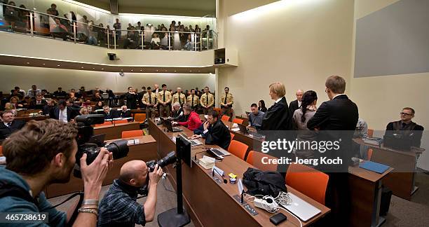 Beate Zschaepe and the other Co-defendants wait for another day of the NSU neo-Nazi murders trial on January 29, 2014 in Munich, Germany....