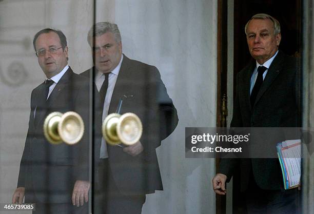 French President Francois Hollande accompanies Junior Minister for Transports and Maritime Economy, Frederic Cuvillier and Prime Minister, Jean-Marc...