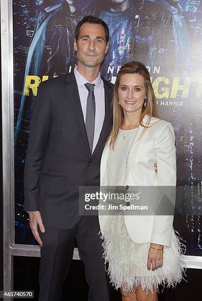 Screenwriter Brad Ingelsby and guest attend the "Run All Night" New York premiere at AMC Lincoln Square Theater on March 9, 2015 in New York City.