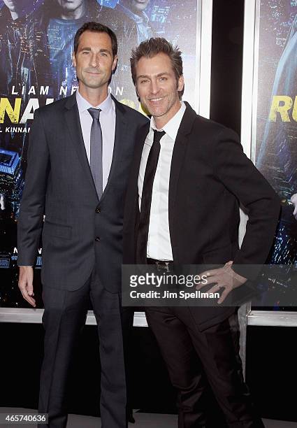 Screenwriter Brad Ingelsby and producer attend the "Run All Night" New York premiere at AMC Lincoln Square Theater on March 9, 2015 in New York City.