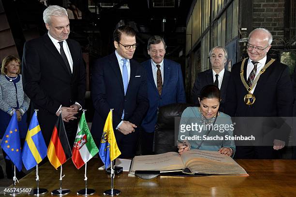 Crown Princess Victoria of Sweden and Prince Daniel of Sweden sign the 'steelbook' of Essen as minister of economics in North Rhine-Westphalia...
