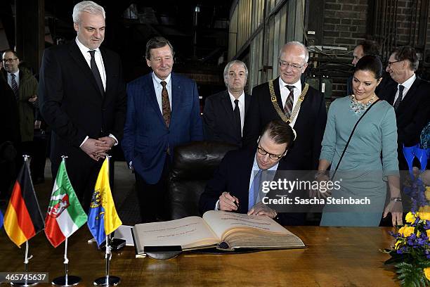 Crown Princess Victoria of Sweden and Prince Daniel of Sweden sign the 'steelbook' of Essen as minister of economics in North Rhine-Westphalia...