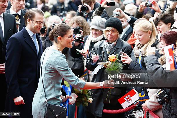 Crown Princess Victoria of Sweden and Prince Daniel of Sweden arrive at the town hall on January 29, 2014 in Dusseldorf, Germany.