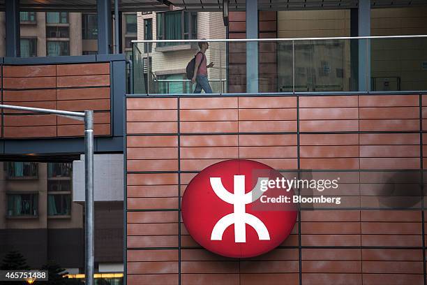 The MTR Corp. Logo is displayed outside HKU Station in Hong Kong, China, on Monday, March 9, 2015. MTR is scheduled to announce earnings on March 16....