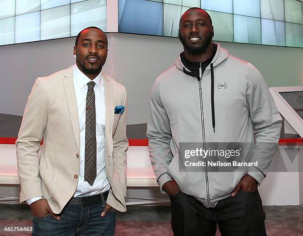 Players Hakeem Nicks and Muhammad Wilkerson attend the Verizon Power House First Look With NFL Stars Muhammad Wilkerson And Hakeem Nicks at Bryant...