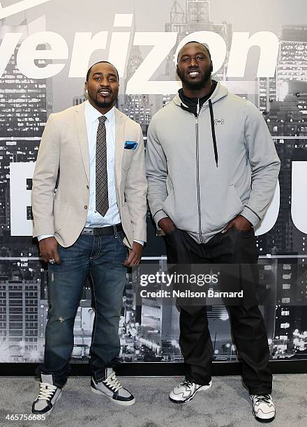 Players Hakeem Nicks and Muhammad Wilkerson attend the Verizon Power House First Look With NFL Stars Muhammad Wilkerson And Hakeem Nicks at Bryant...