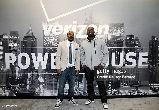 Players Hakeem Nicks and Muhammad Wilkerson attend the Verizon Power House First Look With NFL Stars Muhammad Wilkerson And Hakeem Nicks at Bryant...