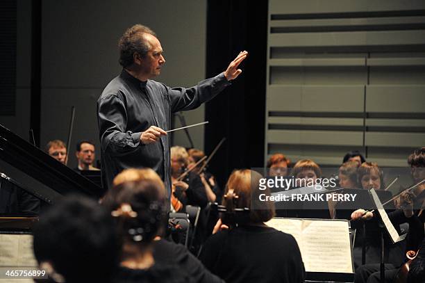 The Ural Philharmonic Orchestra, directed by Russian conductor Dmitry Liss , interprets a piece by American composer George Gershwin at the 20th...