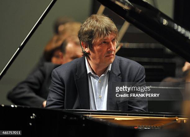 Russian pianist Boris Berezovsky plays a piece by American composer George Gershwin with the Ural Philharmonic Orchestra at the 20th edition of the...